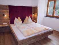 a bed with a wooden table